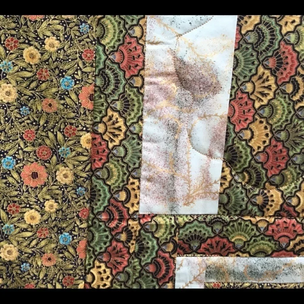 NWT. Hands Crafted Greens & Gold Quilt